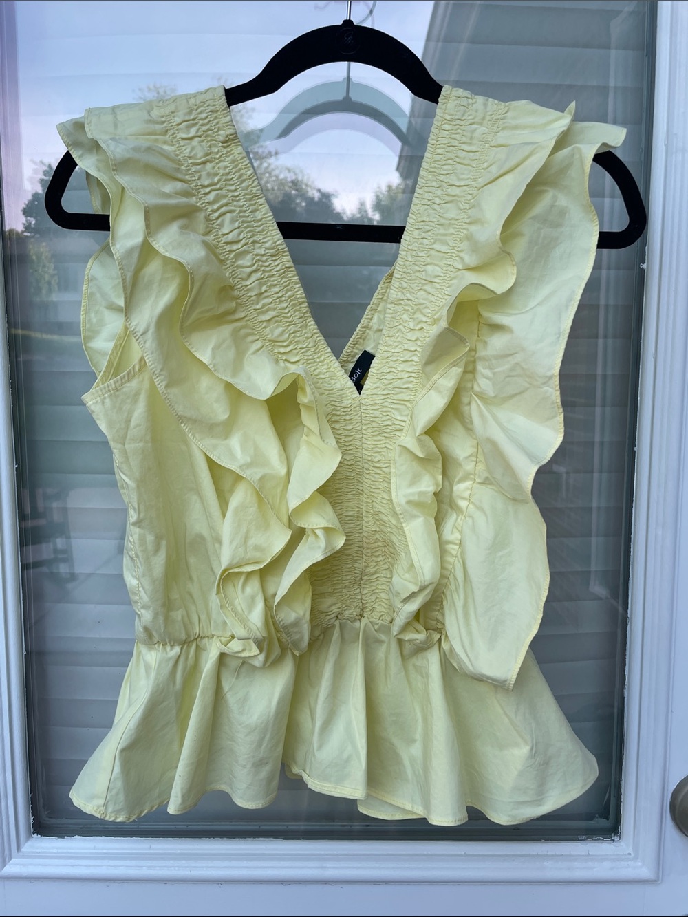 Strut and Bolt Ruffled V-Neck Peplum Blouse in Light Yellow